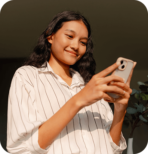 Young woman reviewing her mobile banking