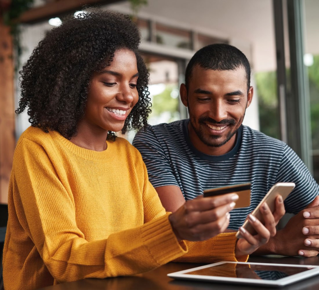 man and woman smiling