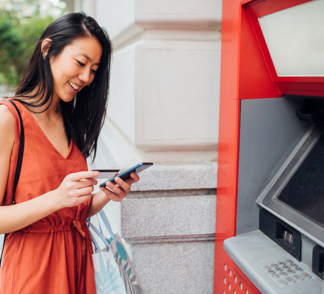 woman at an ATM machine