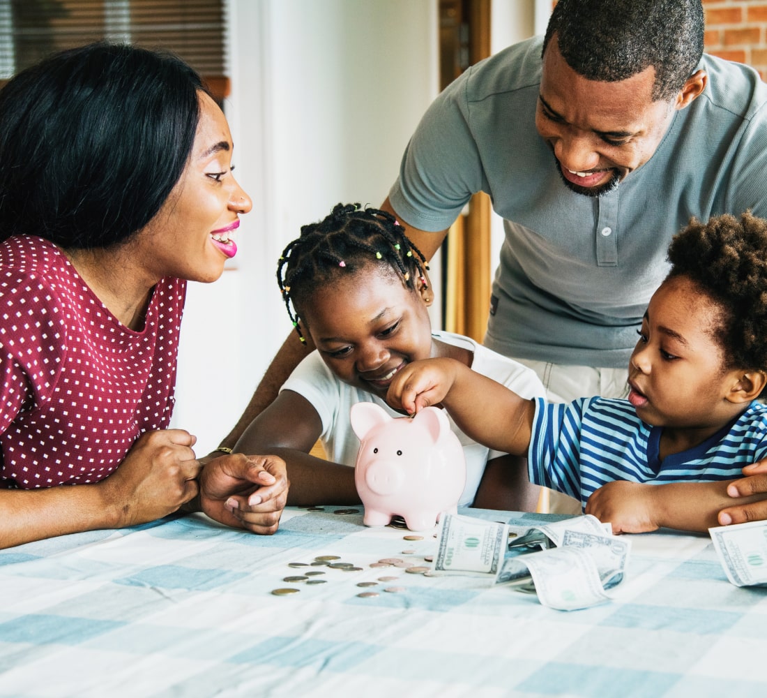 family with piggy bank