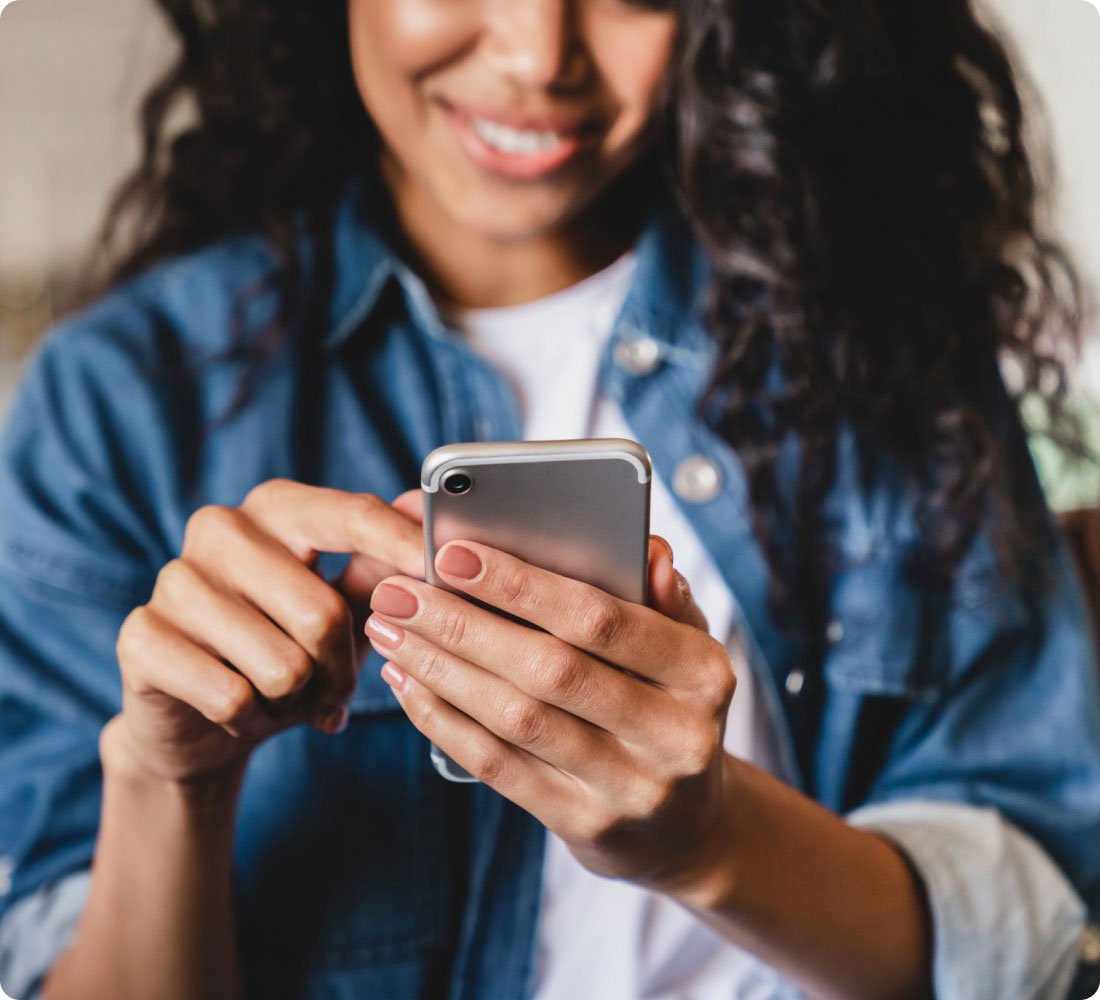 close-up of girl looking at phone