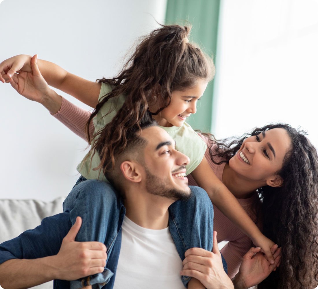 mother and father with little girl