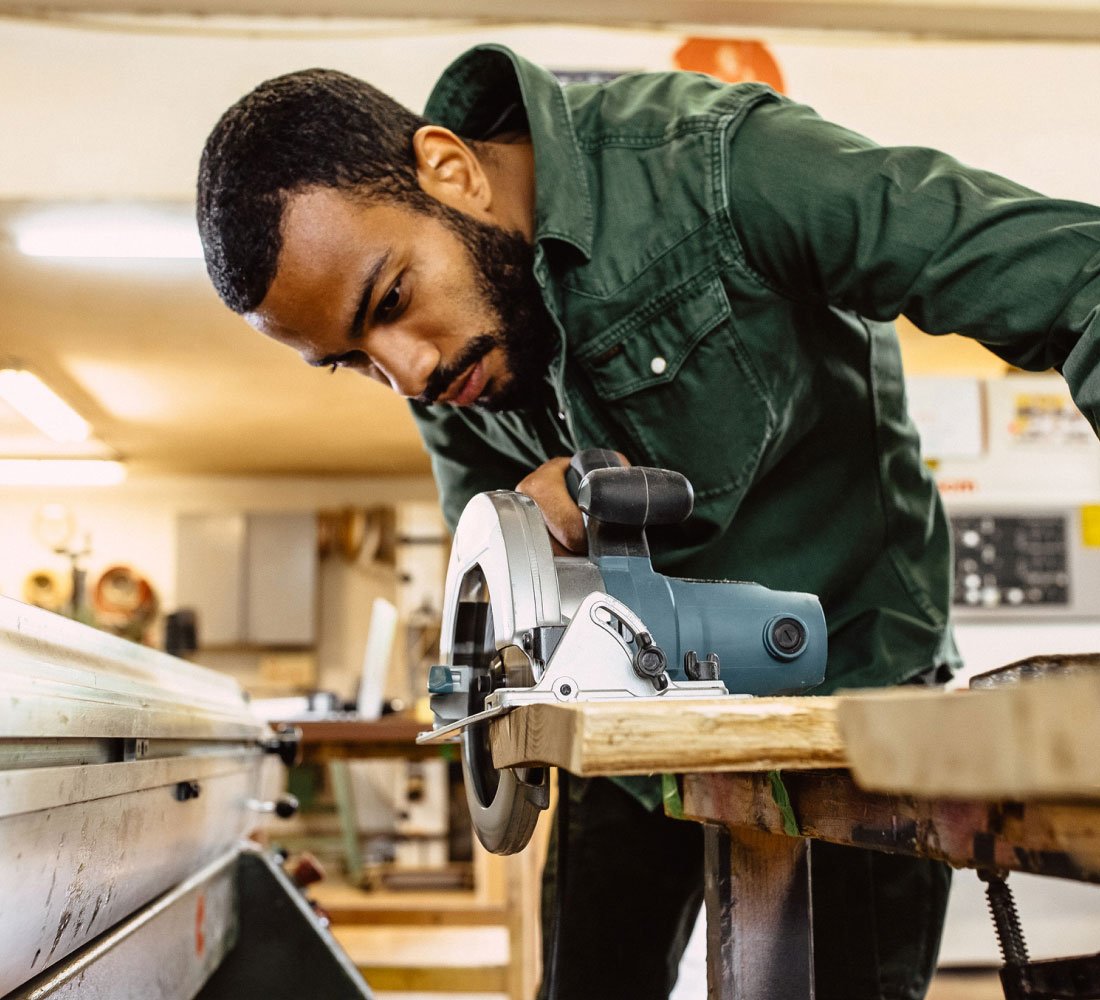 man using saw